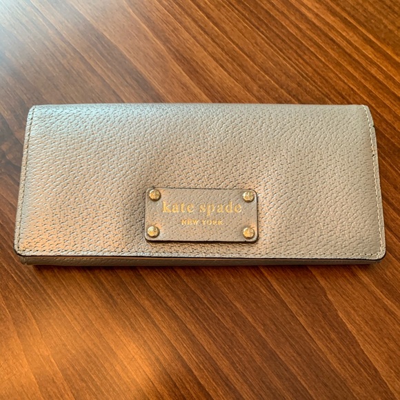 kate spade Handbags - Kate Spade Silver Leather Wallet